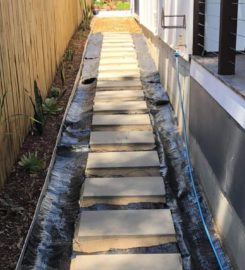 Landscaping in Lota – Paving (Rogers Little Loaders)