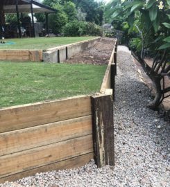 Retaining wall replacement and turf