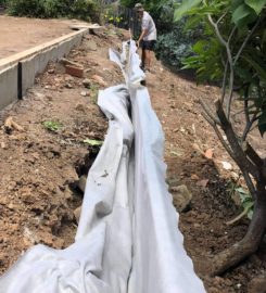 Retaining wall replacement and turf