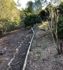 Retaining wall replacement and turf