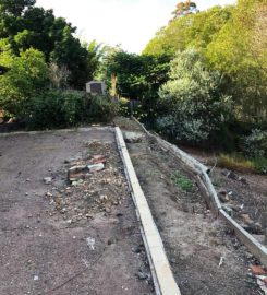 Retaining wall replacement and turf